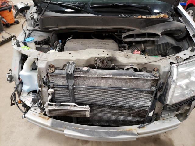 Photo 12 from auction – 2011 HONDA PILOT LX with VIN 5FNYF4H24BB043355