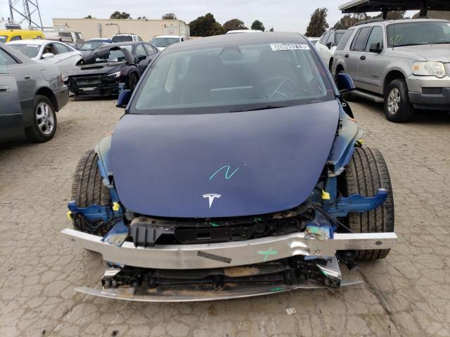 Photo 5 from auction – 2022 TESLA MODEL 3 with VIN 5YJ3E1EA4NF144312