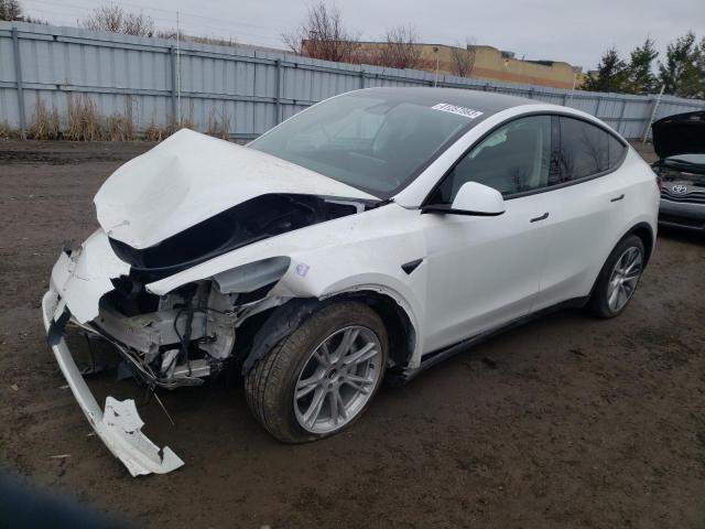 TESLA MODEL Y 2022 with VIN 7SAYGAEE7NF383374 - Photo from auction