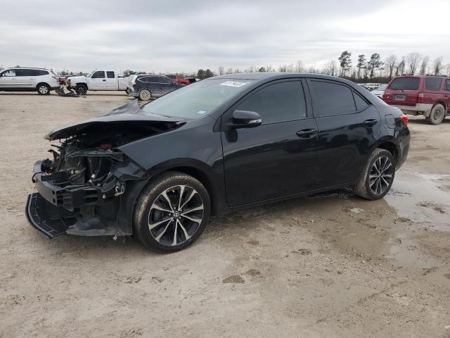 TOYOTA COROLLA L 2018 with VIN 5YFBURHE7JP738340 - Photo from auction