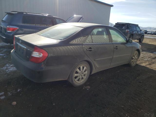 Photo 3 from auction – 2002 TOYOTA CAMRY LE with VIN JTDBF30K320048802