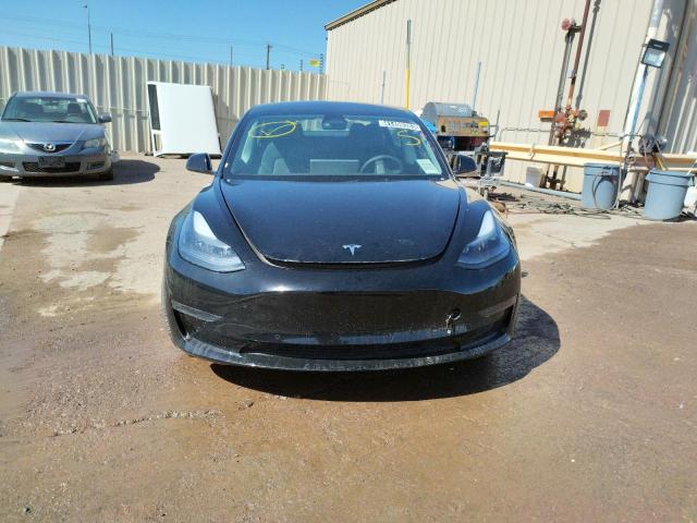 Photo 5 from auction – 2022 TESLA MODEL 3 with VIN 5YJ3E1EA5NF304696