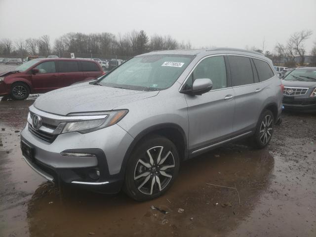 HONDA PILOT TOUR 2021 with VIN 5FNYF6H91MB076129 - Photo from auction