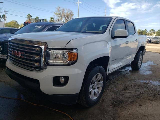 GMC CANYON SLE 2018 with VIN 1GTG5CEA7J1295368 - Photo from auction