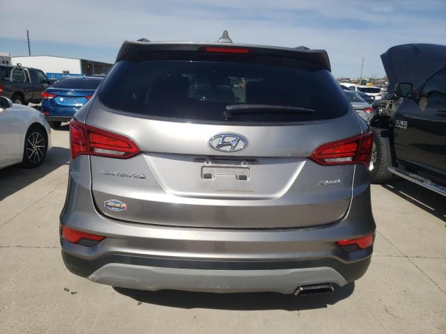 Photo 6 from auction – 2018 HYUNDAI SANTA FE S with VIN 5NMZU3LB1JH098113