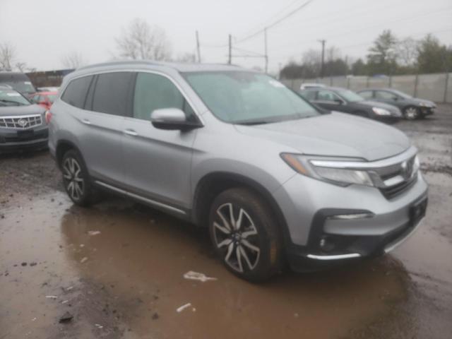 Photo 4 from auction – 2021 HONDA PILOT TOUR with VIN 5FNYF6H91MB076129