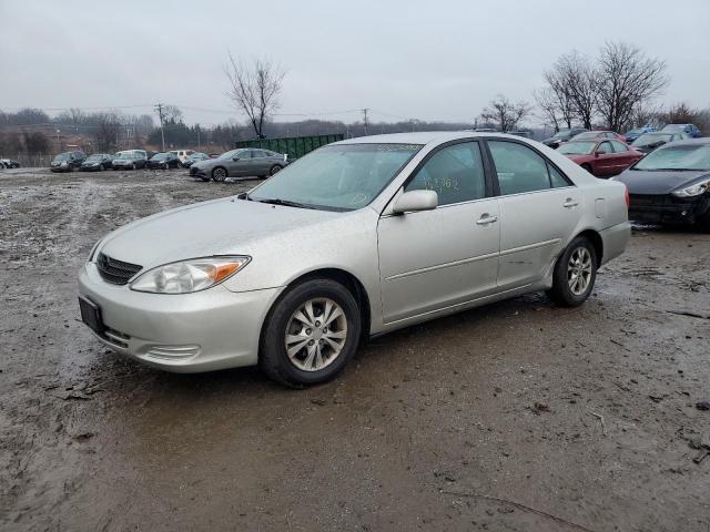 TOYOTA CAMRY LE 2004 with VIN 4T1BF30K74U573398 - Photo from auction