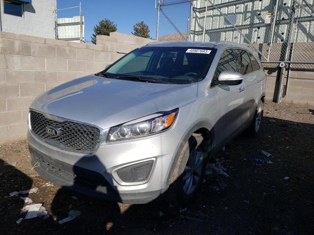 KIA SORENTO LX 2018 with VIN 5XYPG4A57JG357733 - Photo from auction
