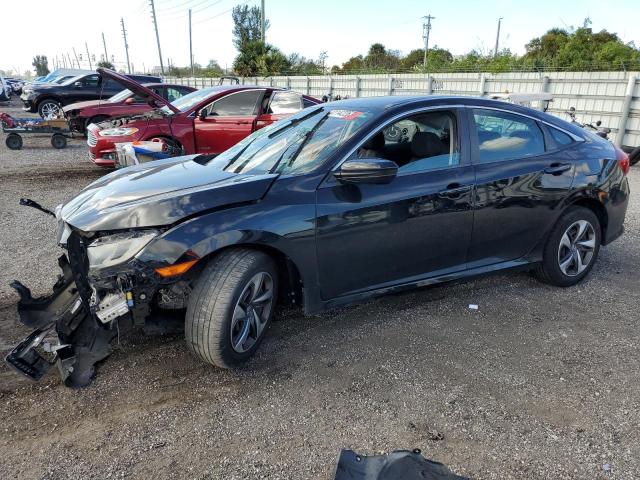 HONDA CIVIC LX 2019 with VIN 19XFC2F63KE040995 - Photo from auction