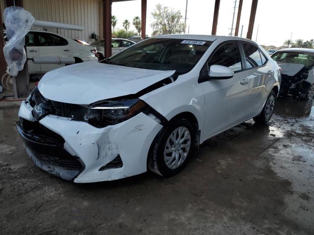 TOYOTA COROLLA L 2019 with VIN 5YFBURHE8KP895845 - Photo from auction