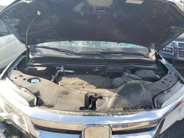 Photo 11 from auction – 2021 HONDA PILOT ELIT with VIN 5FNYF6H0XMB069133