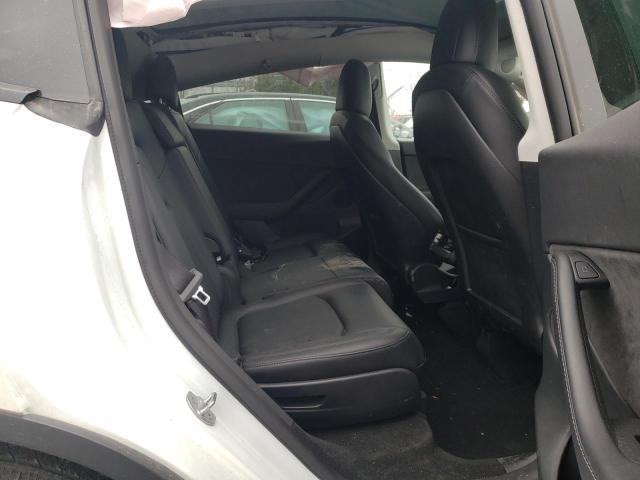 Photo 11 from auction – 2022 TESLA MODEL Y with VIN 7SAYGAEE7NF383374