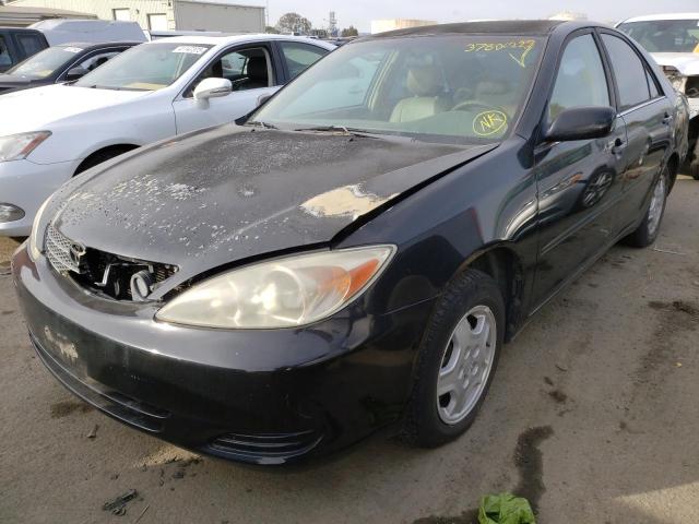 TOYOTA CAMRY 2002 with VIN 4T1BF30K32U014265 - Photo from auction