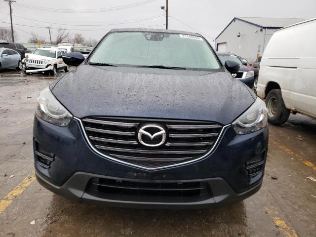 Photo 5 from auction – 2016 MAZDA CX-5 GT with VIN JM3KE4DY6G0854199