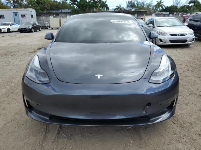 Photo 5 from auction – 2021 TESLA MODEL 3 with VIN 5YJ3E1EA4MF019082