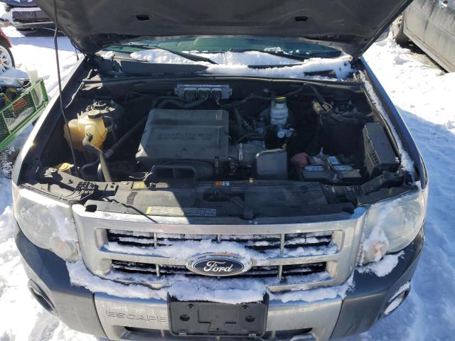 Photo 12 from auction – 2011 FORD ESCAPE LIM with VIN 1FMCU9EG1BKB28116