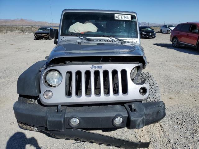 Photo 5 from auction – 2014 JEEP WRANGLER U with VIN 1C4BJWDG8EL247627