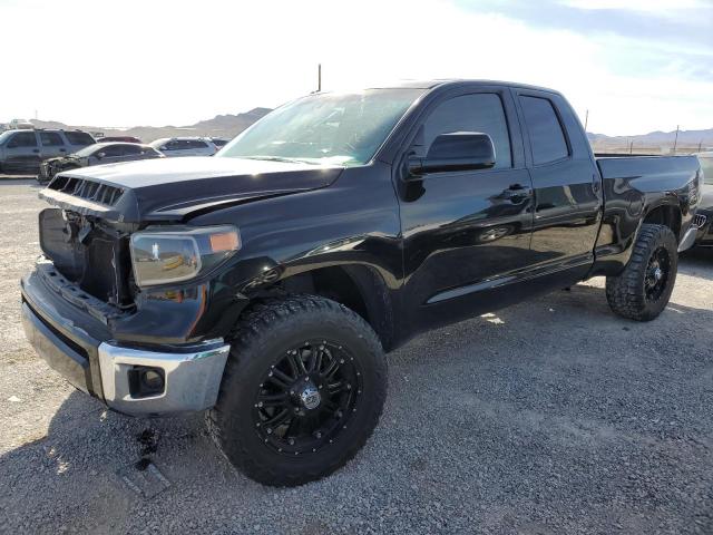 TOYOTA TUNDRA DOU 2014 with VIN 5TFRM5F19EX073679 - Photo from auction