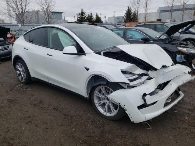 Photo 4 from auction – 2022 TESLA MODEL Y with VIN 7SAYGAEE7NF383374