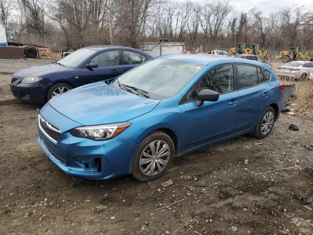 SUBARU IMPREZA 2019 with VIN 4S3GTAA68K3722851 - Photo from auction