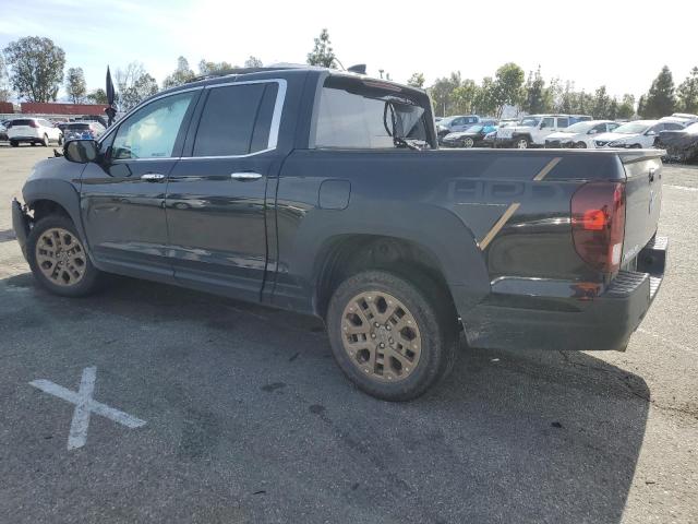 Photo 2 from auction – 2021 HONDA RIDGELINE with VIN 5FPYK3F72MB025211