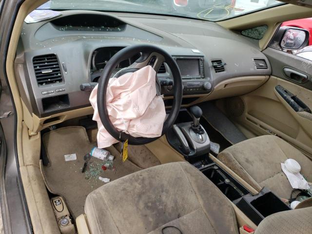 Photo 8 from auction – 2006 HONDA CIVIC HYBR with VIN JHMFA36296S003427