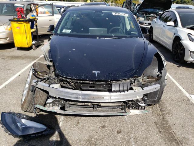Photo 5 from auction – 2022 TESLA MODEL 3 with VIN 5YJ3E1EB5NF187453