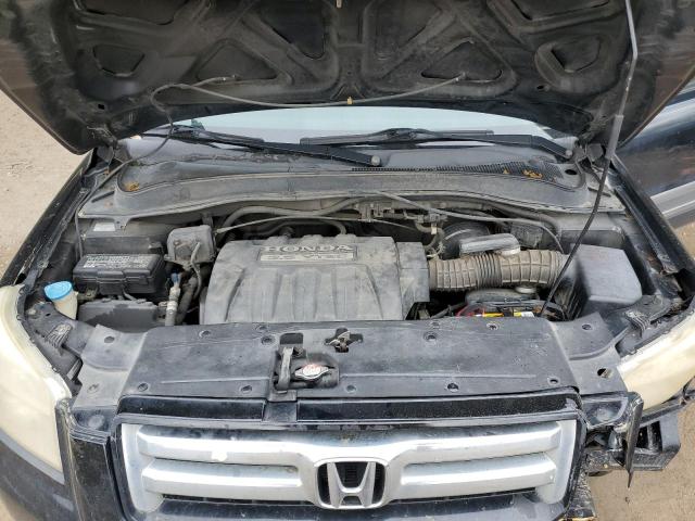 Photo 12 from auction – 2005 HONDA PILOT LX with VIN 2HKYF181X5H571428