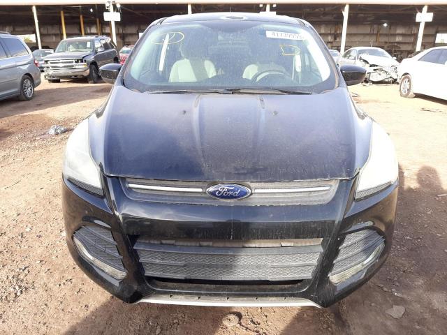 Photo 5 from auction – 2014 FORD ESCAPE SE with VIN 1FMCU0GX7EUB31815