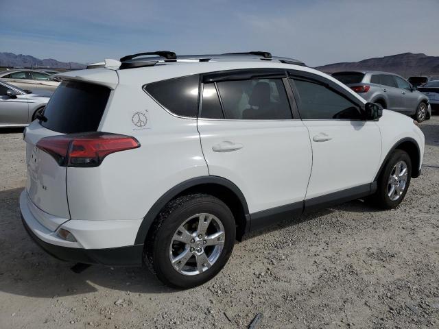 Photo 3 from auction – 2018 TOYOTA RAV4 LE with VIN 2T3ZFREV7JW416266