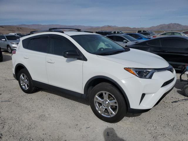 Photo 4 from auction – 2018 TOYOTA RAV4 LE with VIN 2T3ZFREV7JW416266