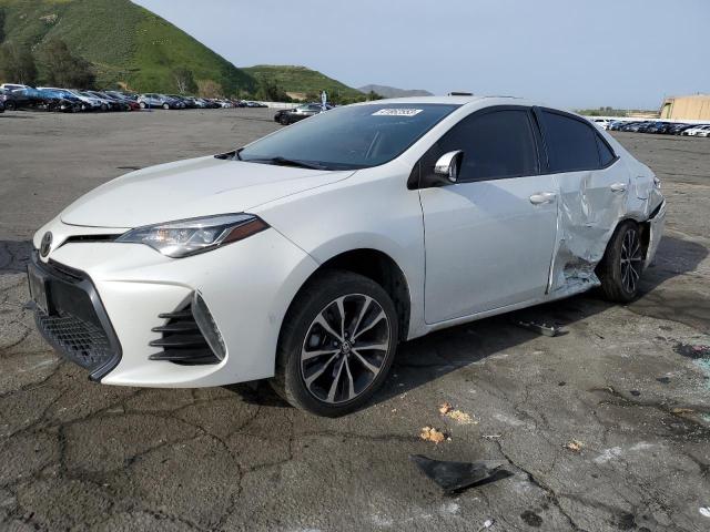 TOYOTA COROLLA L 2017 with VIN 5YFBURHE2HP673780 - Photo from auction
