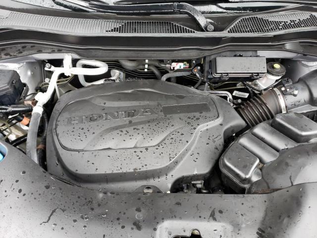 Photo 11 from auction – 2021 HONDA PASSPORT E with VIN 5FNYF8H57MB014002
