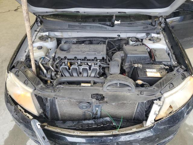 Photo 11 from auction – 2009 KIA OPTIMA LX with VIN KNAGE228X95345970