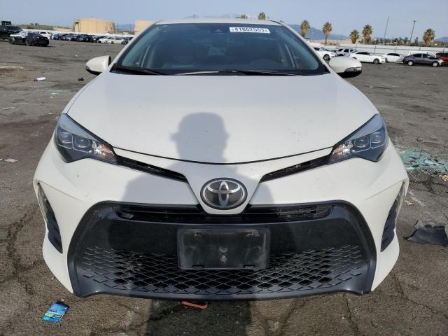 Photo 5 from auction – 2017 TOYOTA COROLLA L with VIN 5YFBURHE2HP673780