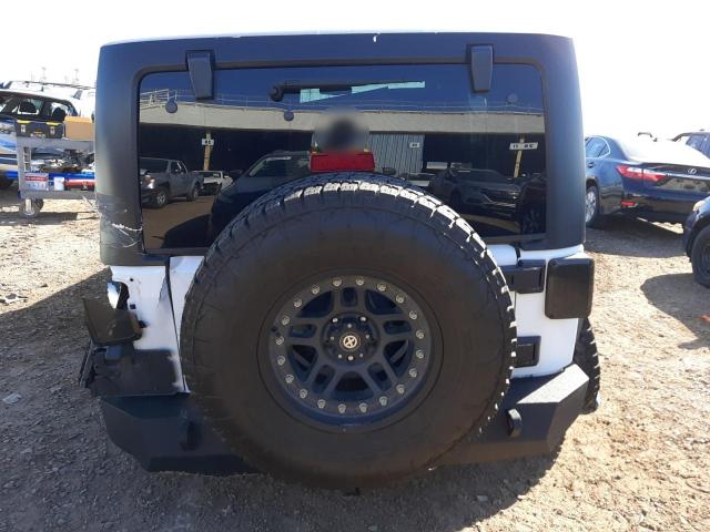 Photo 6 from auction – 2014 JEEP WRANGLER U with VIN 1C4BJWDG0EL184474
