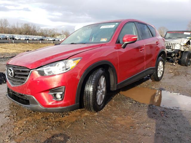 MAZDA CX-5 TOURI 2016 with VIN JM3KE4CY5G0648678 - Photo from auction