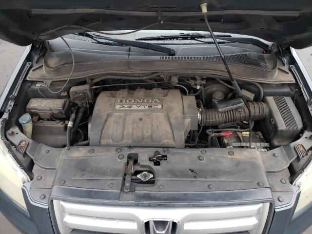Photo 11 from auction – 2006 HONDA PILOT EX with VIN 2HKYF18656H513675