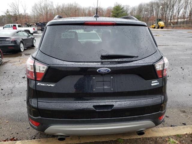 Photo 6 from auction – 2018 FORD ESCAPE SEL with VIN 1FMCU9HDXJUC85308