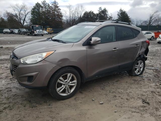 HYUNDAI TUCSON GLS 2012 with VIN KM8JUCAC4CU466770 - Photo from auction