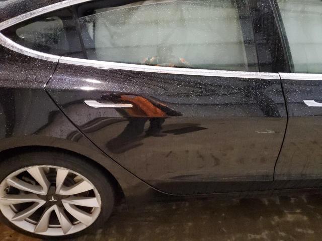 Photo 10 from auction – 2019 TESLA MODEL 3 with VIN 5YJ3E1EB3KF199838