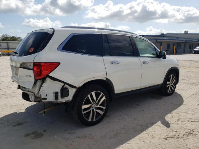 Photo 3 from auction – 2018 HONDA PILOT TOUR with VIN 5FNYF5H97JB022629