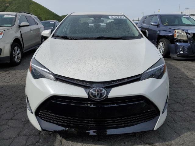 Photo 5 from auction – 2017 TOYOTA COROLLA L with VIN 5YFBURHE5HP603691