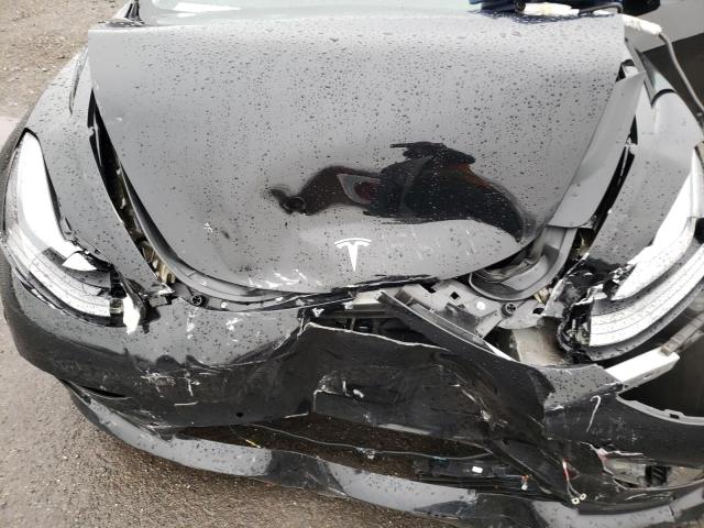 Photo 11 from auction – 2022 TESLA MODEL 3 with VIN 5YJ3E1EB4NF289763