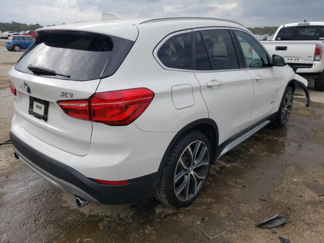 Photo 3 from auction – 2016 BMW X1 XDRIVE2 with VIN WBXHT3C34G5E54286