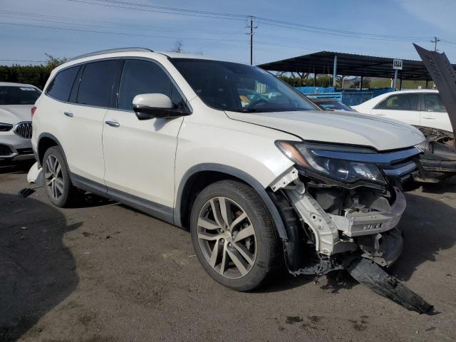Photo 4 from auction – 2017 HONDA PILOT TOUR with VIN 5FNYF5H95HB026558