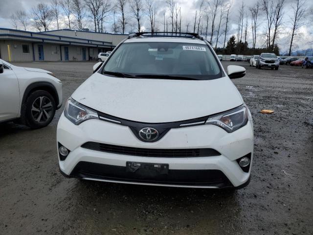 Photo 5 from auction – 2017 TOYOTA RAV4 XLE with VIN JTMRFREV5HD203954