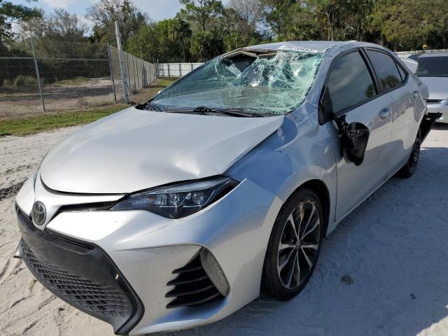 TOYOTA COROLLA L 2018 with VIN 5YFBURHE5JP783132 - Photo from auction