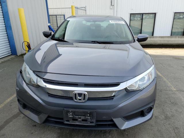 Photo 5 from auction – 2016 HONDA CIVIC LX with VIN 19XFC2F62GE219584