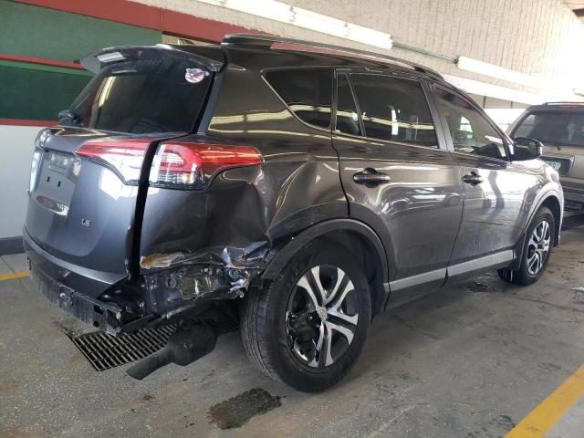 Photo 3 from auction – 2018 TOYOTA RAV4 LE with VIN JTMZFREV5JJ166511